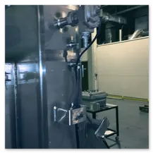 Industrial Bag Dump Station to Aeromechanical Conveyor